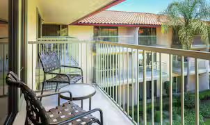 Private guestroom balcony overlooking the hotel grounds