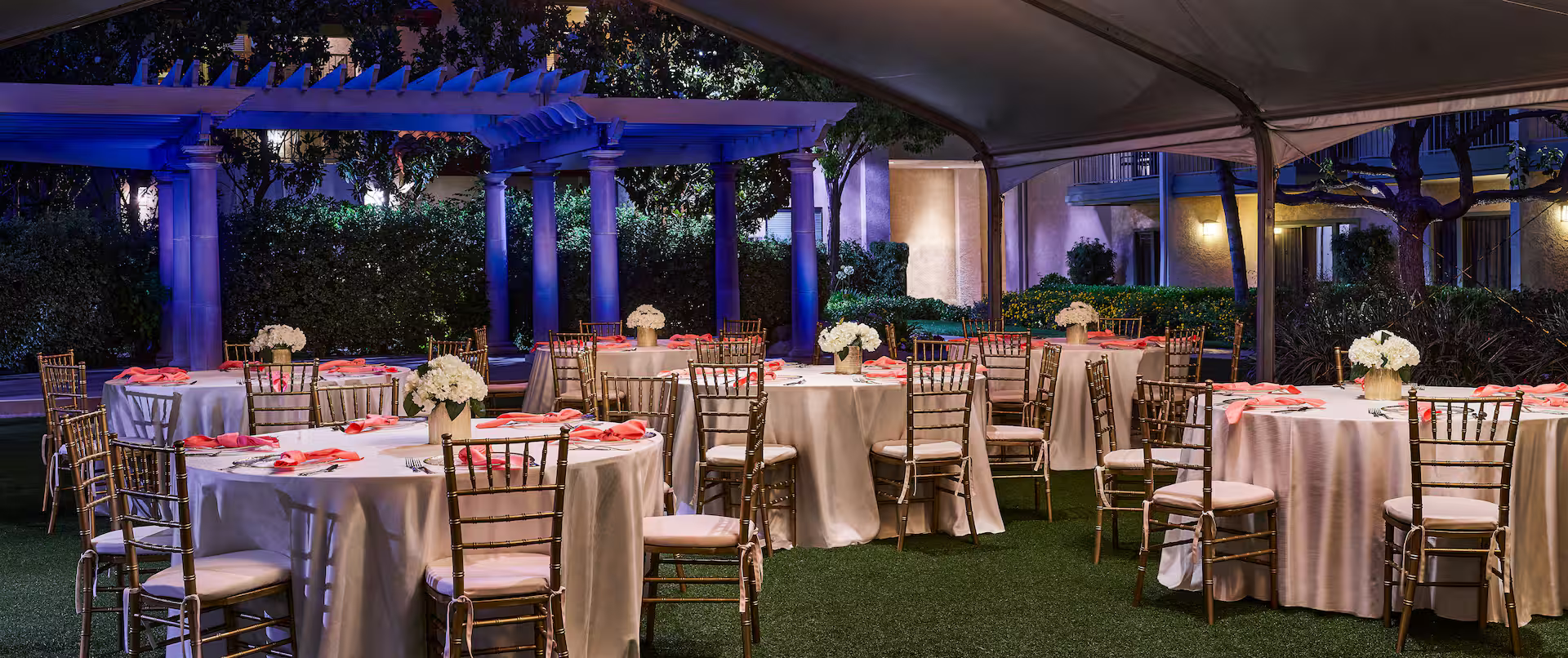 Outdoor courtyard arranged for an elegant reception