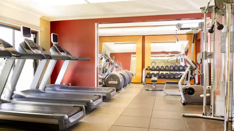 Hotel fitness center with cardio and strength equipment