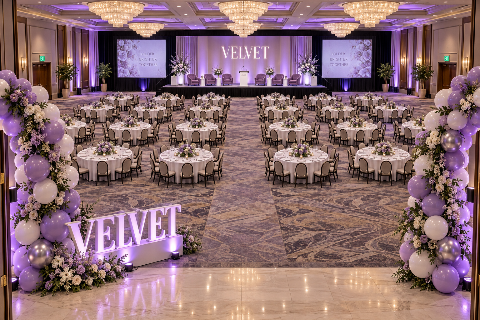 Elegant VELVET conference room with lavender lighting, round tables, floral arrangements and a main stage